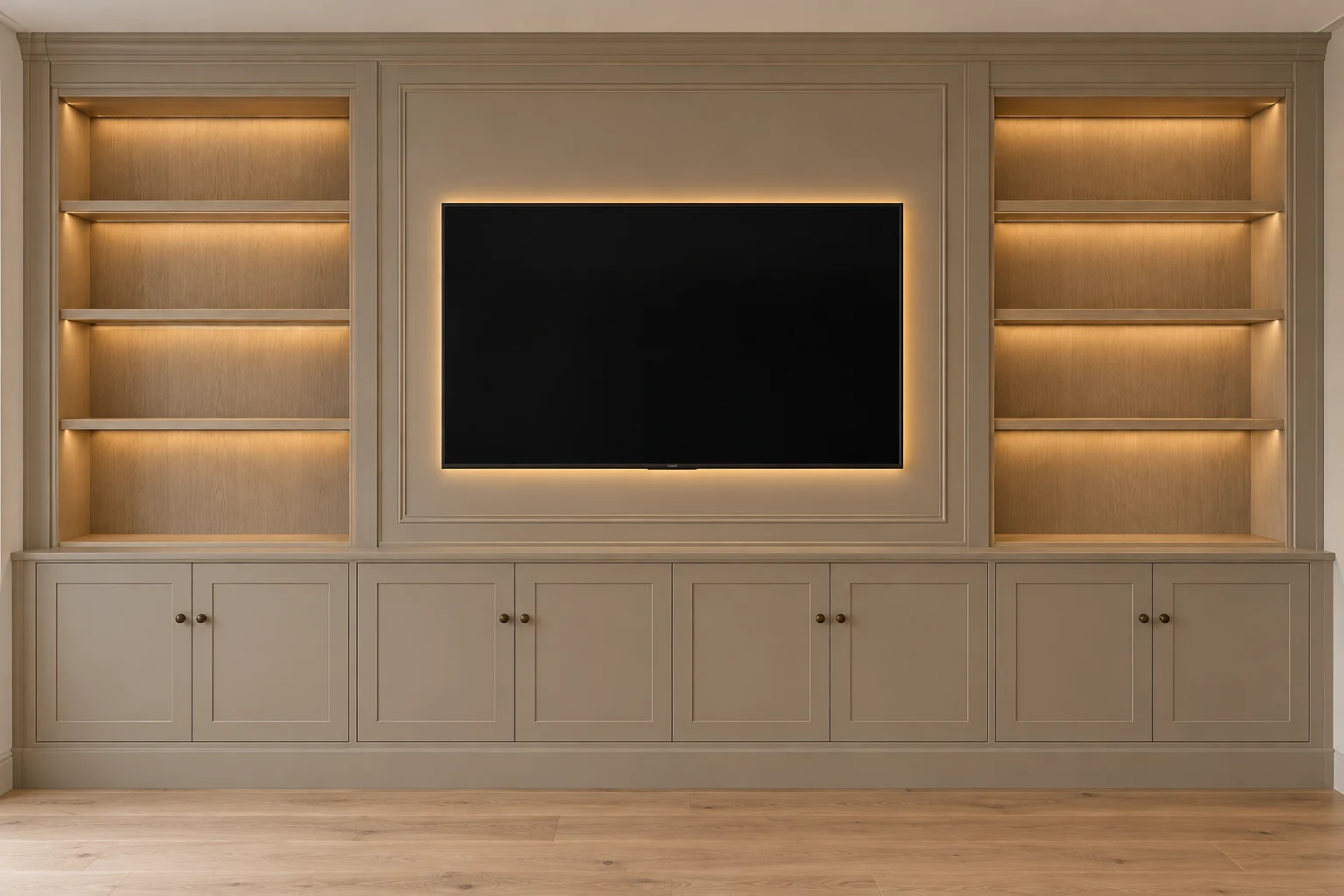 Front-view media wall visualisation with taupe base cabinets, empty light oak shelves and concealed lighting behind the TV